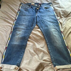 Anthropologie women’s mid-rise denim jeans. Size 32.